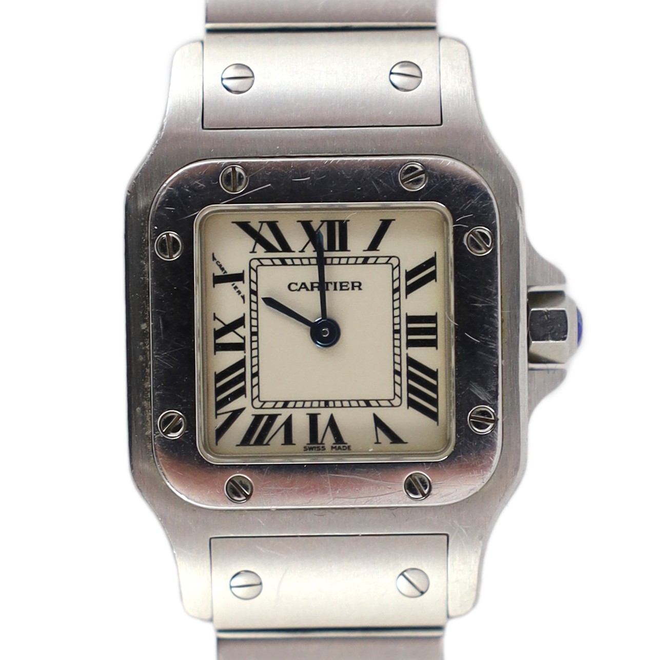 A lady's stainless steel Cartier Santos quartz wrist watch, on a stainless steel Cartier bracelet